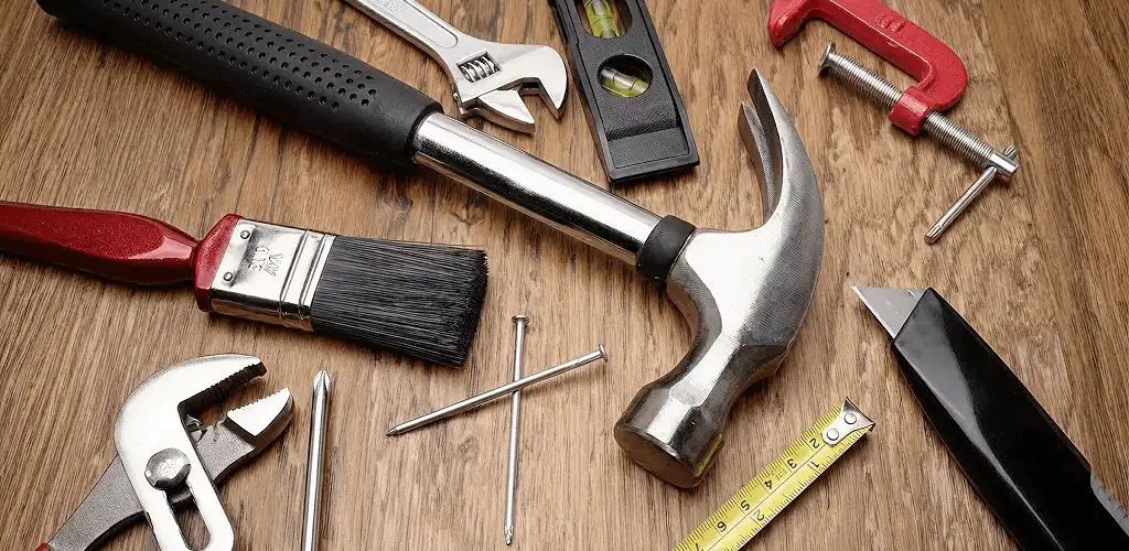 Handyman tools laid out for home repair and maintenance work in Des Moines, IA