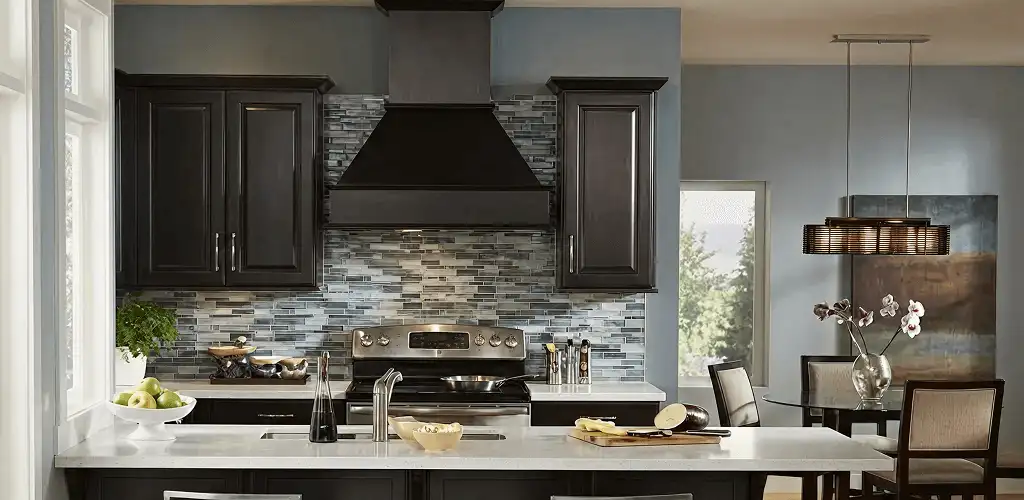 Kitchen cabinet painting and refinishing in a modern kitchen in Des Moines, IA