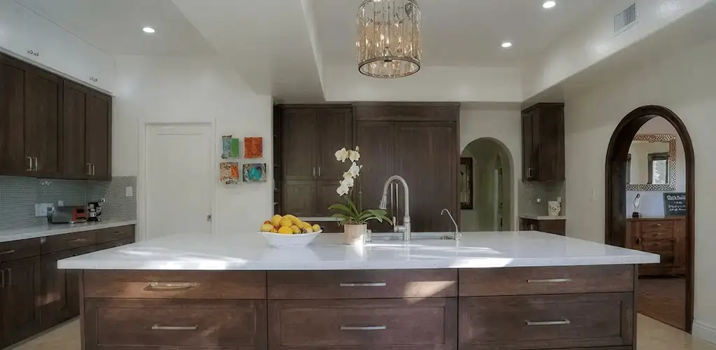Cabinet refacing project with updated kitchen cabinets and island in Des Moines, IA